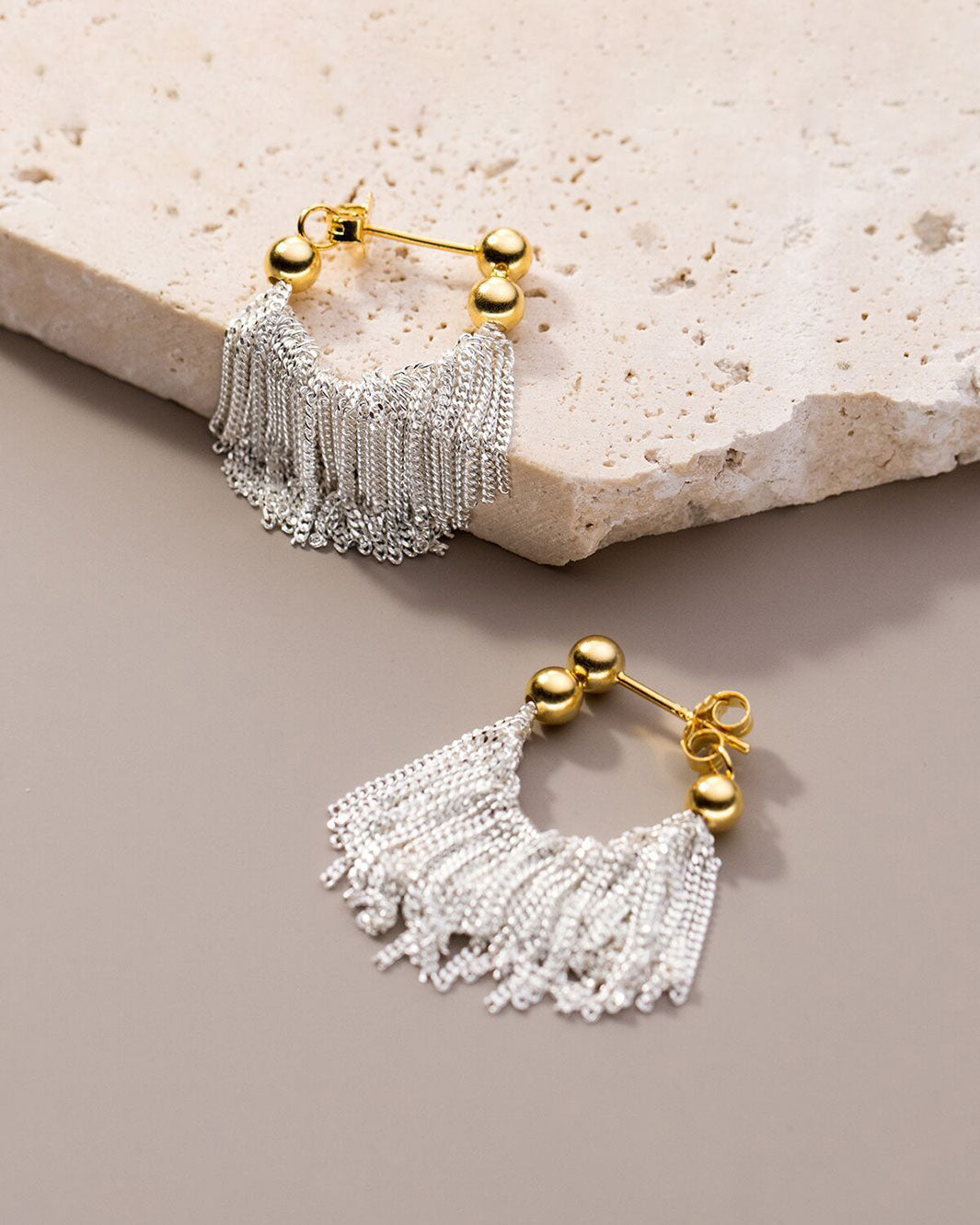 Dual Tone Gleaming Tassel Earrings