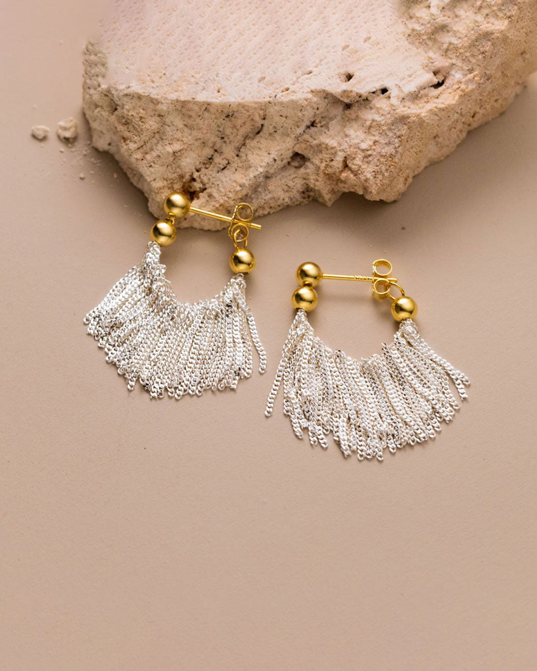 Dual Tone Gleaming Tassel Earrings