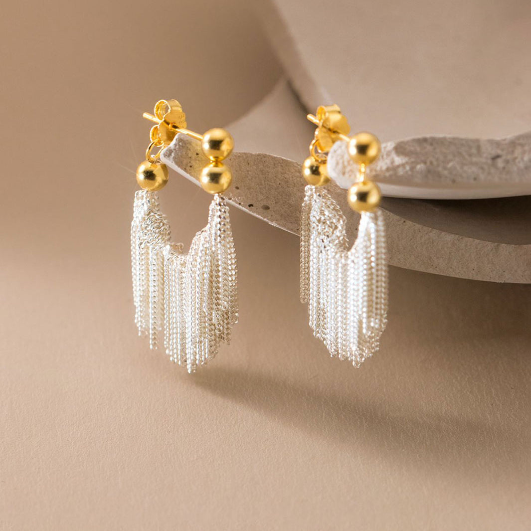 Dual Tone Gleaming Tassel Earrings