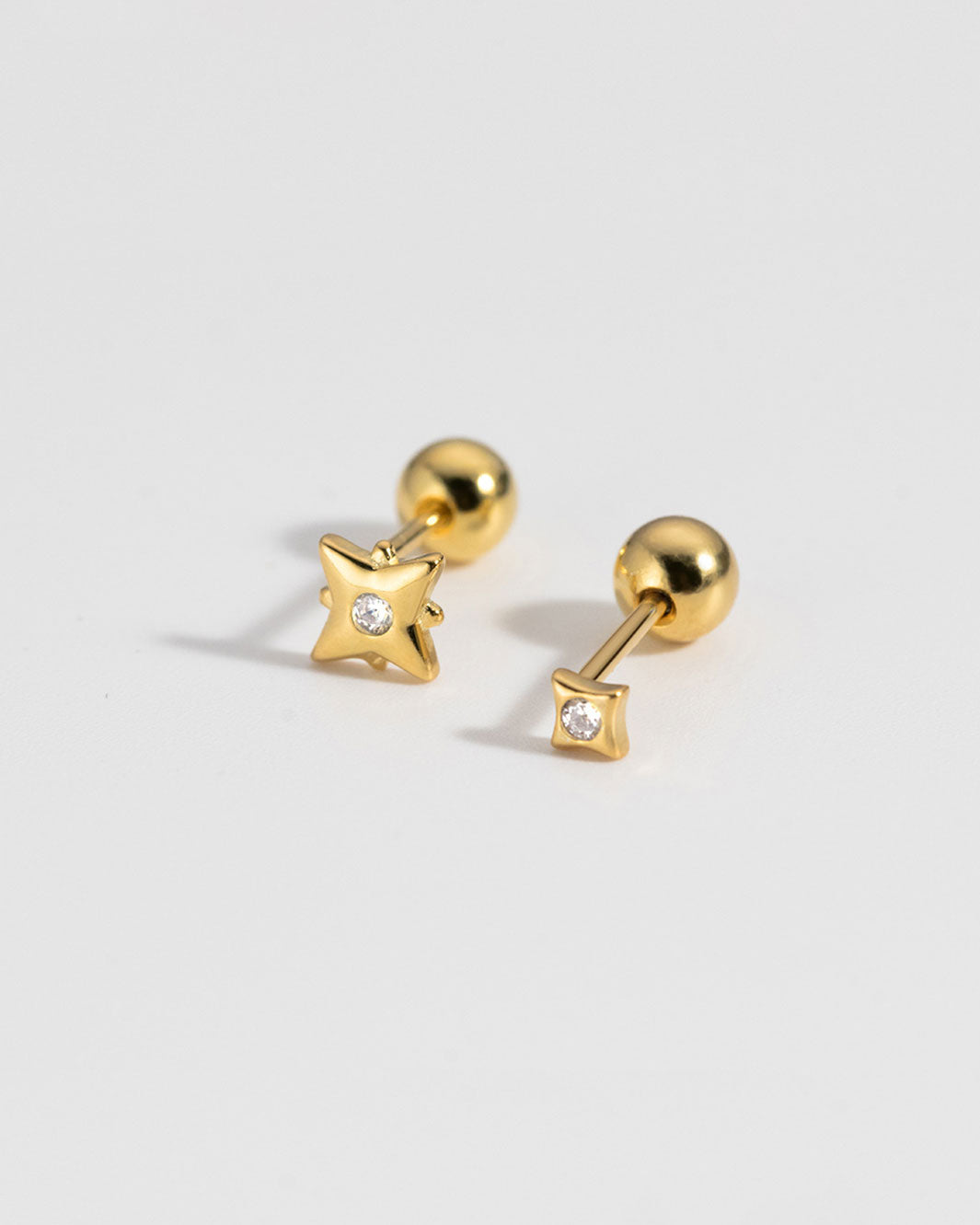 Tara Mismatch Star Barbell Earrings