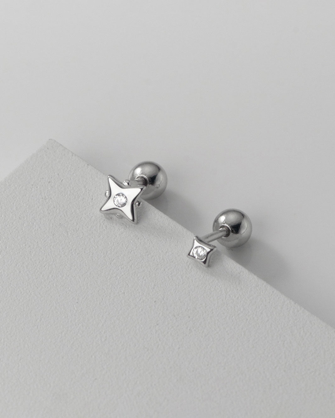 Tara Mismatch Star Barbell Earrings