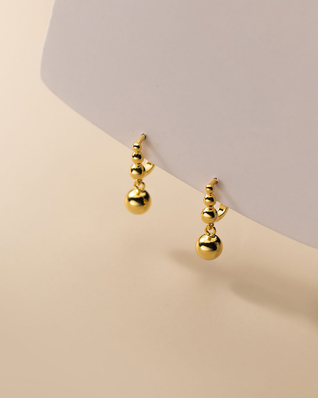 Oaia Beaded Charm Huggie Earrings