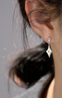 Seren Mismatch Star Drop Earrings