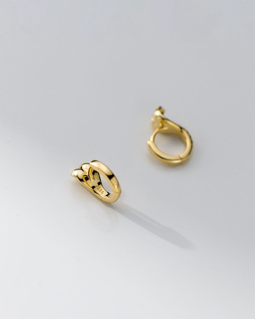 Black-Eyed Cobra Huggie Earrings