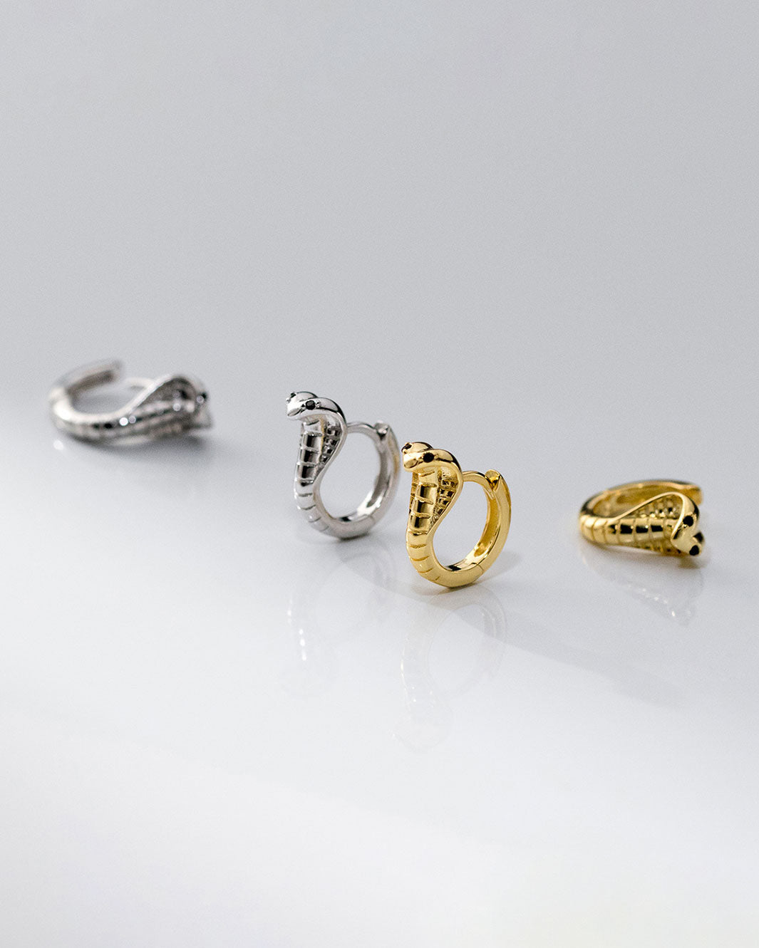 Black-Eyed Cobra Huggie Earrings