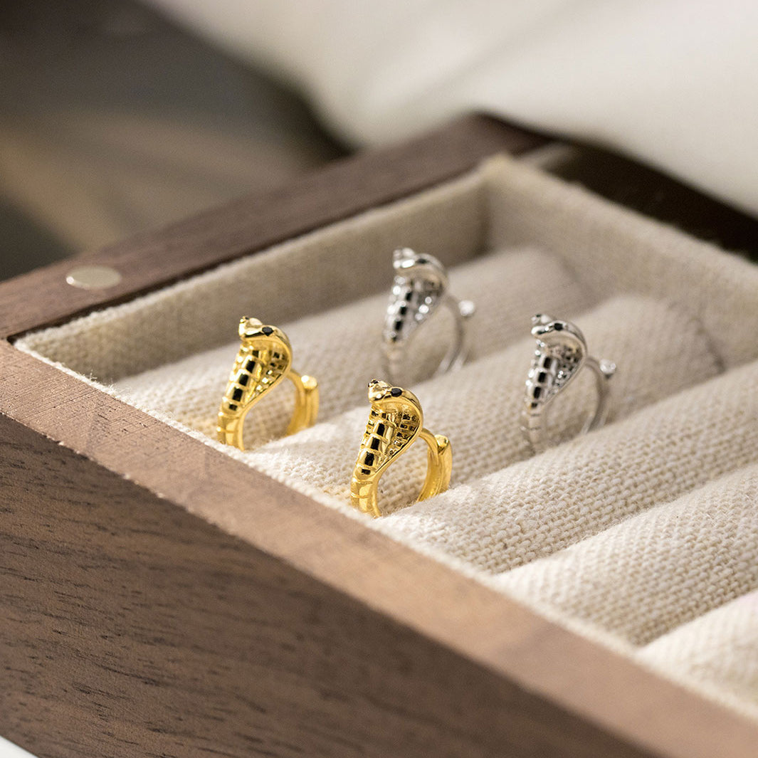 Black-Eyed Cobra Huggie Earrings