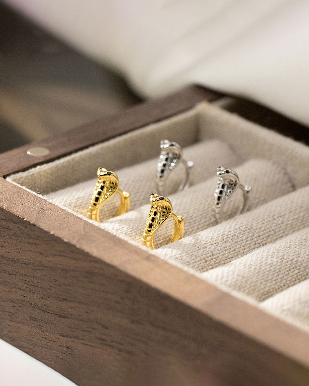 Black-Eyed Cobra Huggie Earrings