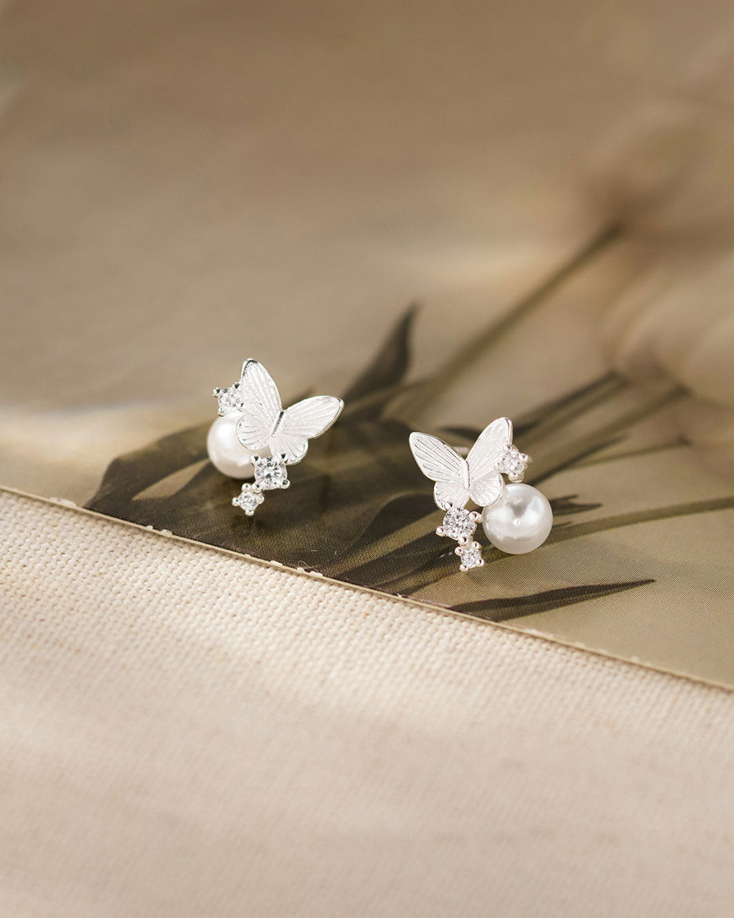 Moonlit Butterfly Pearl Stud Earrings