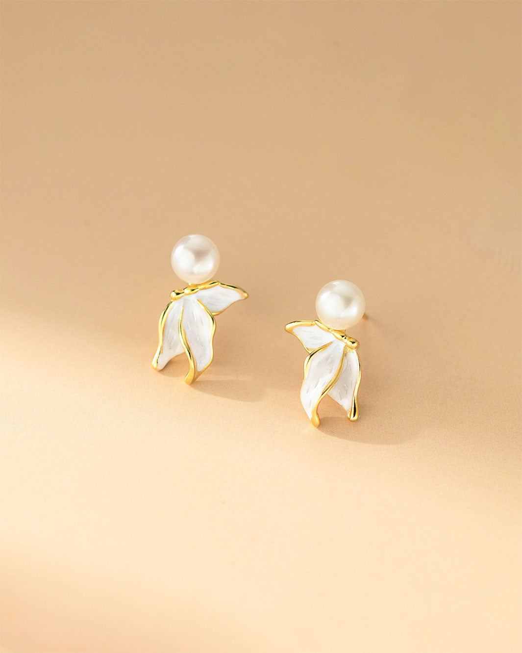 Naia Pearl Fishtail Drop Earrings