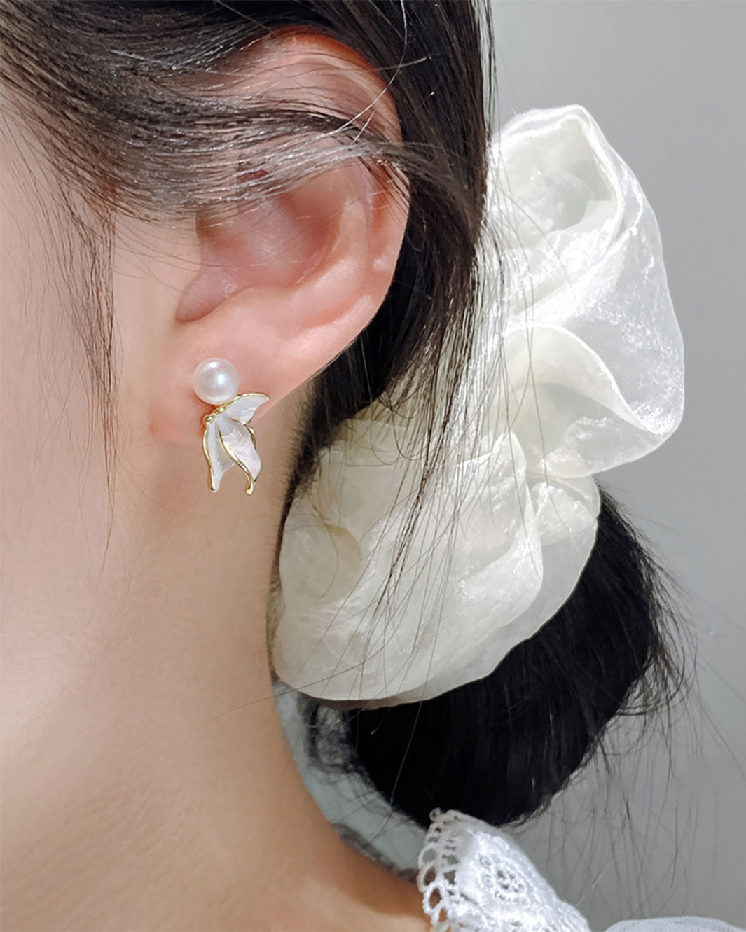 Naia Pearl Fishtail Drop Earrings