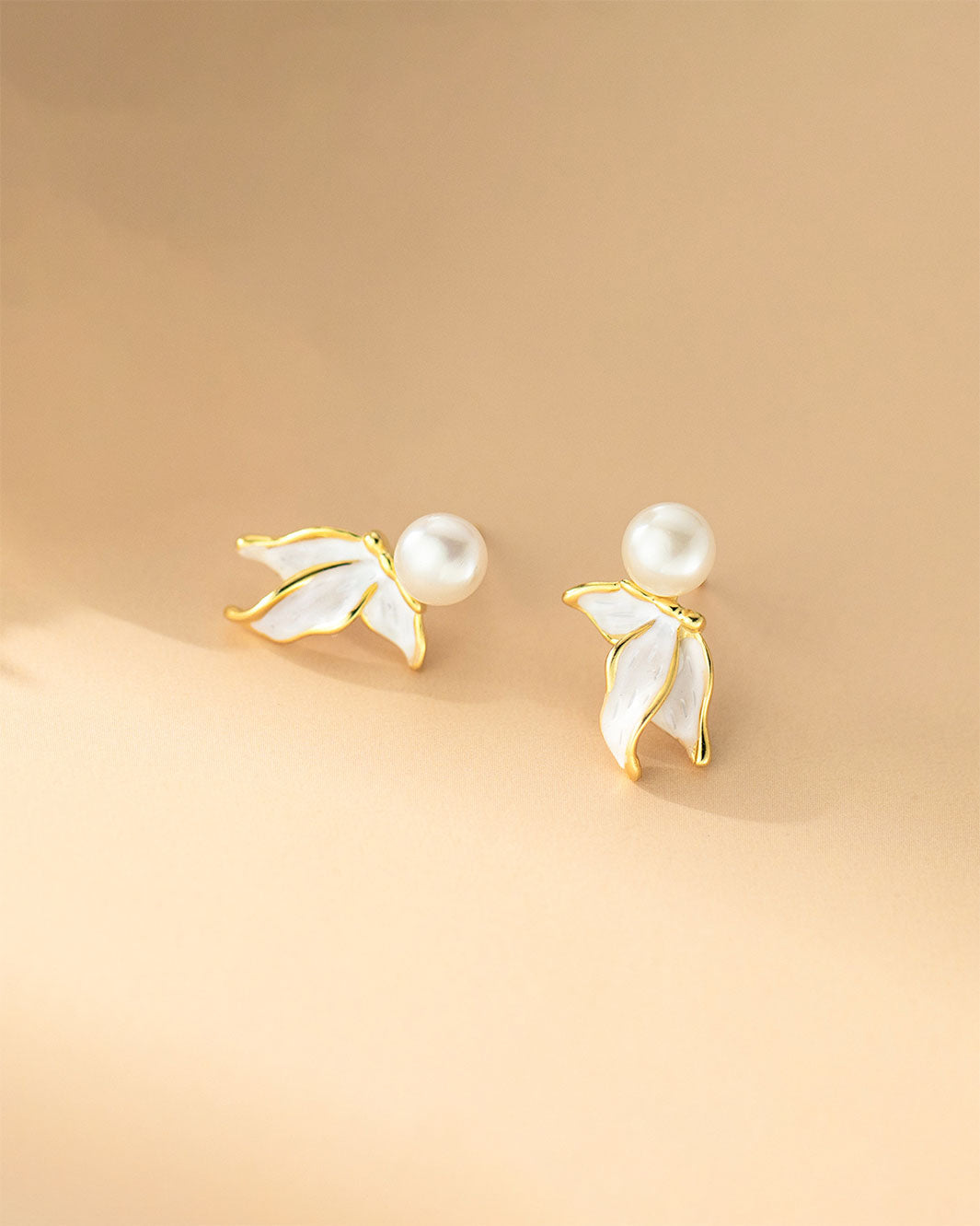 Naia Pearl Fishtail Drop Earrings