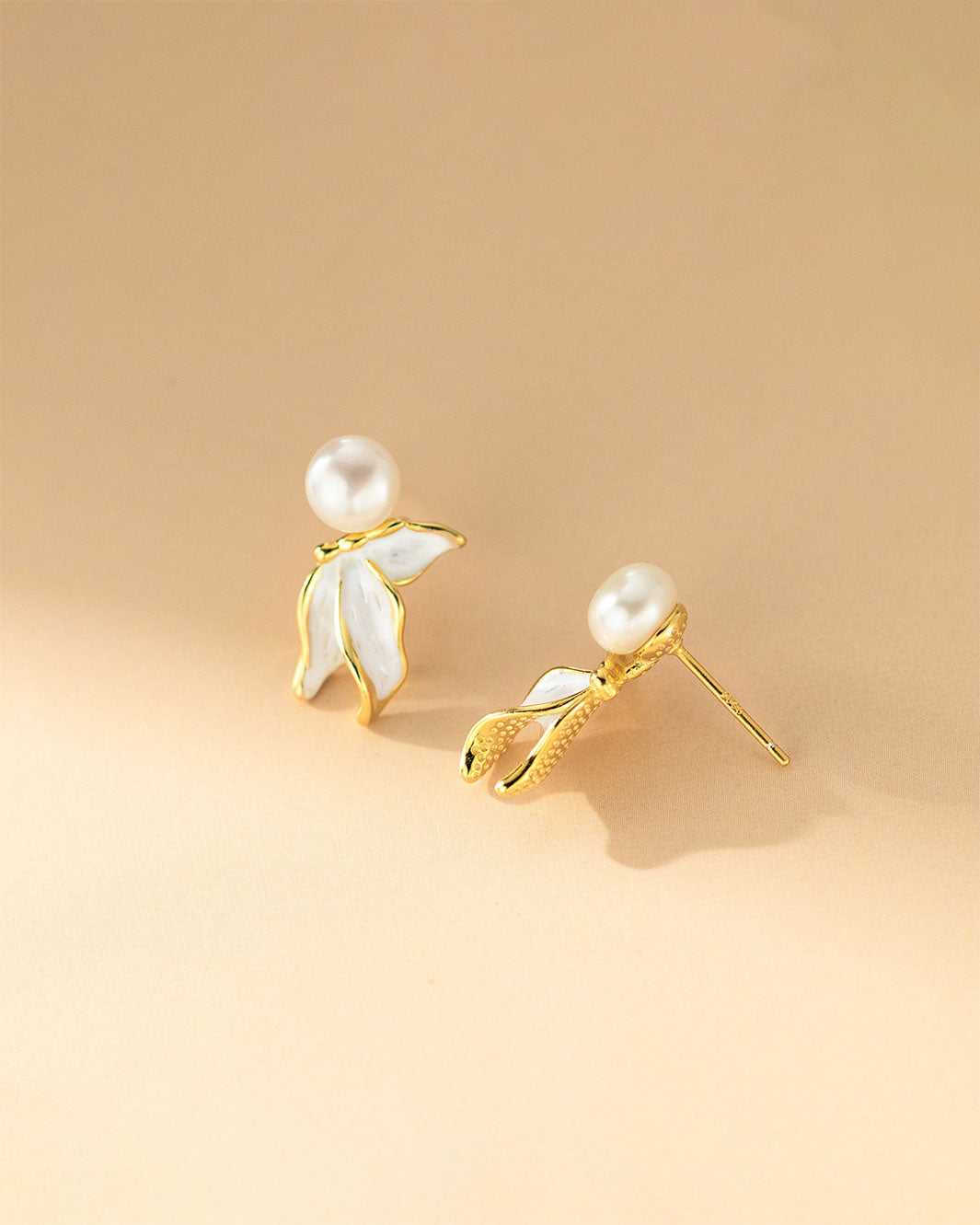 Naia Pearl Fishtail Drop Earrings