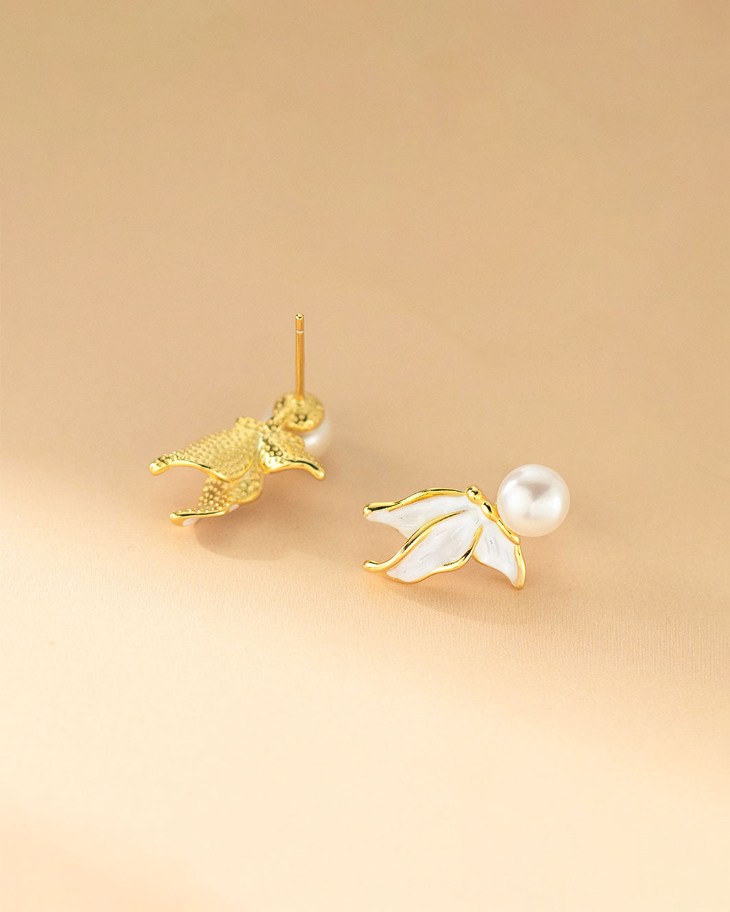 Naia Pearl Fishtail Drop Earrings