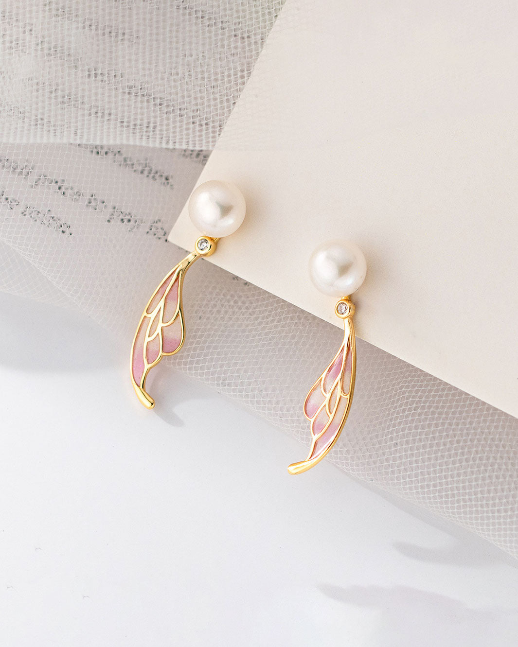 Lumi Pearl Butterfly Jacket Earrings